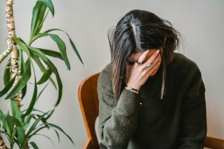 True Cost of a Bad Hire true cost of a bad hire, woman with head in hands