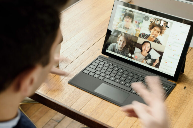 Video Conferencing Etiquette Video Conferencing Etiquette man on video call in front of laptop