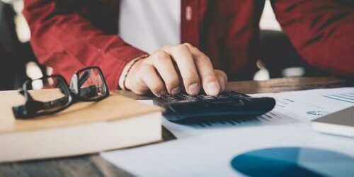 A talented ecommerce marketing manager is key for successful website marketing plans. An ecommerce marketing manager working at a desktop.