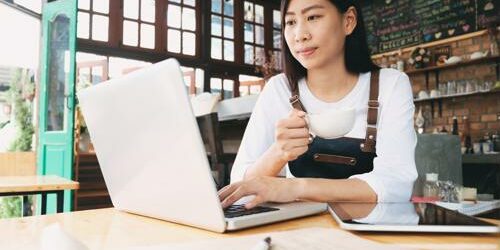 Content strategists are both analytical and creative. woman working on computer content strategy