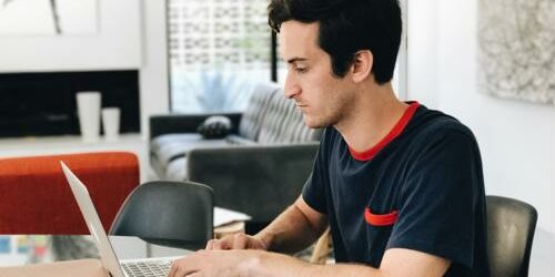 Freelancers can help you tackle creative projects with lower costs than bringing on full-time employees. freelancer working on laptop