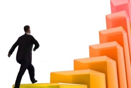 Man-Climbing-Steps Man climbing colorful steps