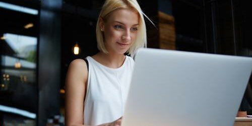 Outsourcing copywriters can help you keep up with the rising demands facing your market. freelance copywriter on laptop