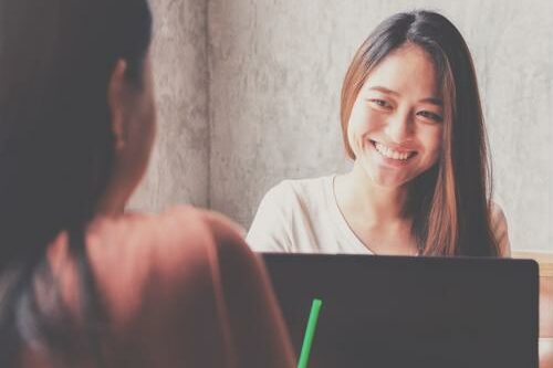 Tired of dreading annual reviews? Try giving casual and frequent feedback instead. Employee meeting with boss for a casual performance review.
