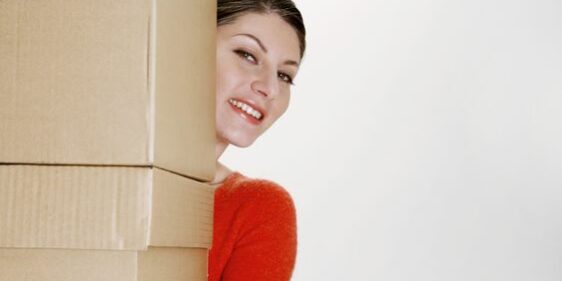Woman-Carrying-Boxes Woman carrying large boxes