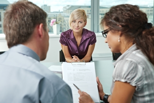 Benefits of hiring a creative employment agency two people interviewing a woman