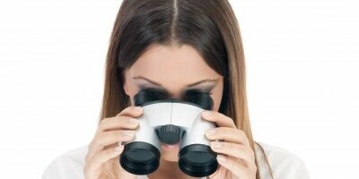 binoculars woman looking through binoculars