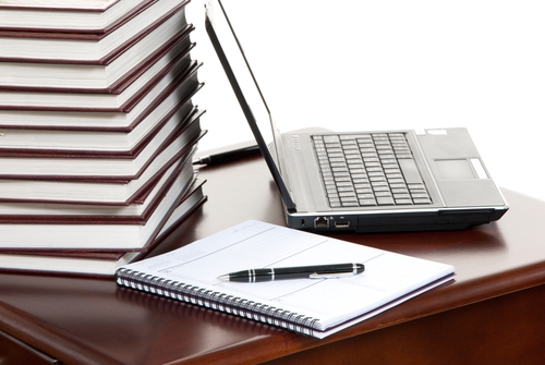 Content marketing – Are you ready? journal sitting at a table with a laptop next to in and a pen on top