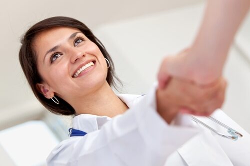 Could a creative staffing professional be the solution to the talent competition? Doctor shaking hands with someone