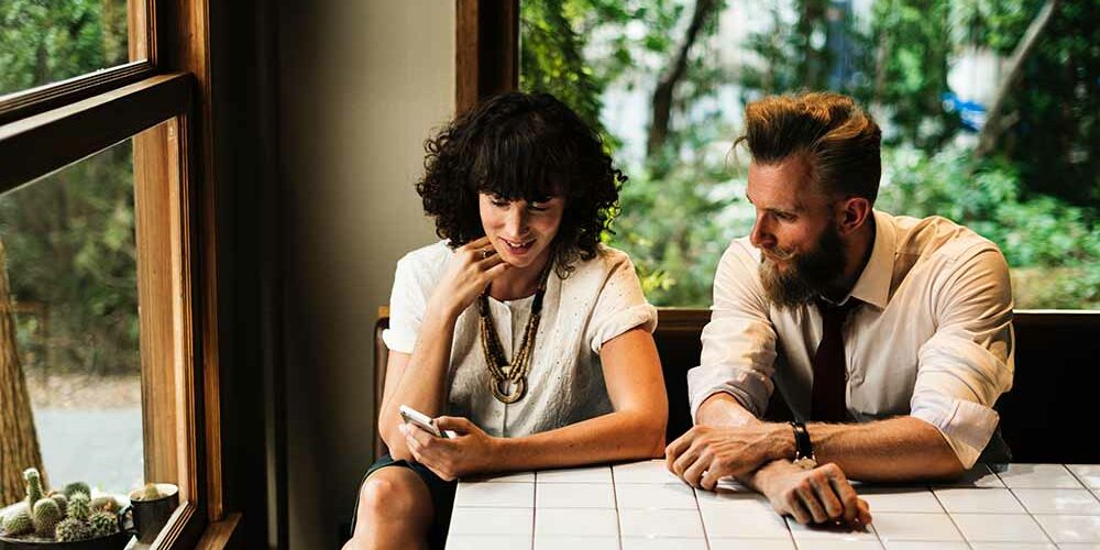 friends-having-conversation-in-coffee-shop friends-having-conversation-in-coffee-shop