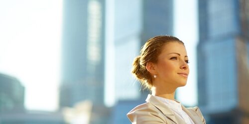 How to create a content dream team woman smiling in front of window