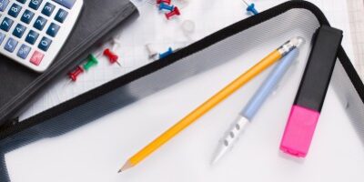 list office supplies sitting on a desk