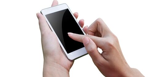 Mobile technology trends for 2013 Woman touching a cellphone