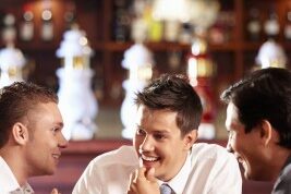pub 3 men after work in a pub