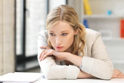 sadinterview woman sad at her desk