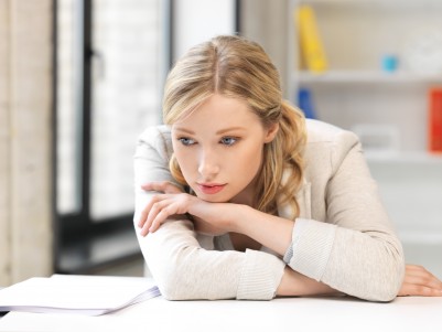 sadinterview woman sad at her desk