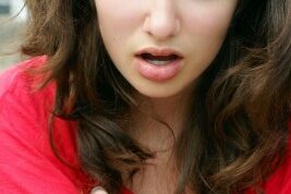 socialmediashocked woman angry as she looks at her phone