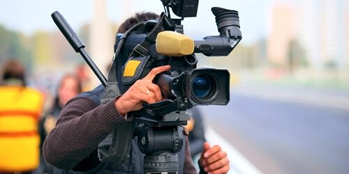 The high ROI of video content marketing Camera man working
