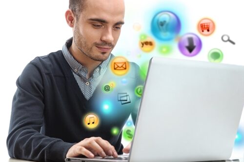 While many website design best practices should be followed across the board, there are certain considerations those in Internet marketing jobs need to make when creating a site for ecommerce Man working on an old laptop with icon bubble floating around him