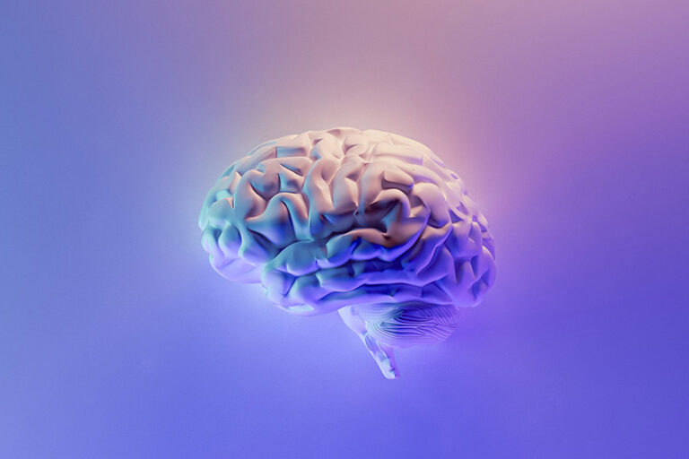 personality-type-at-work-brain-image Image of a brain on a pink and purple background