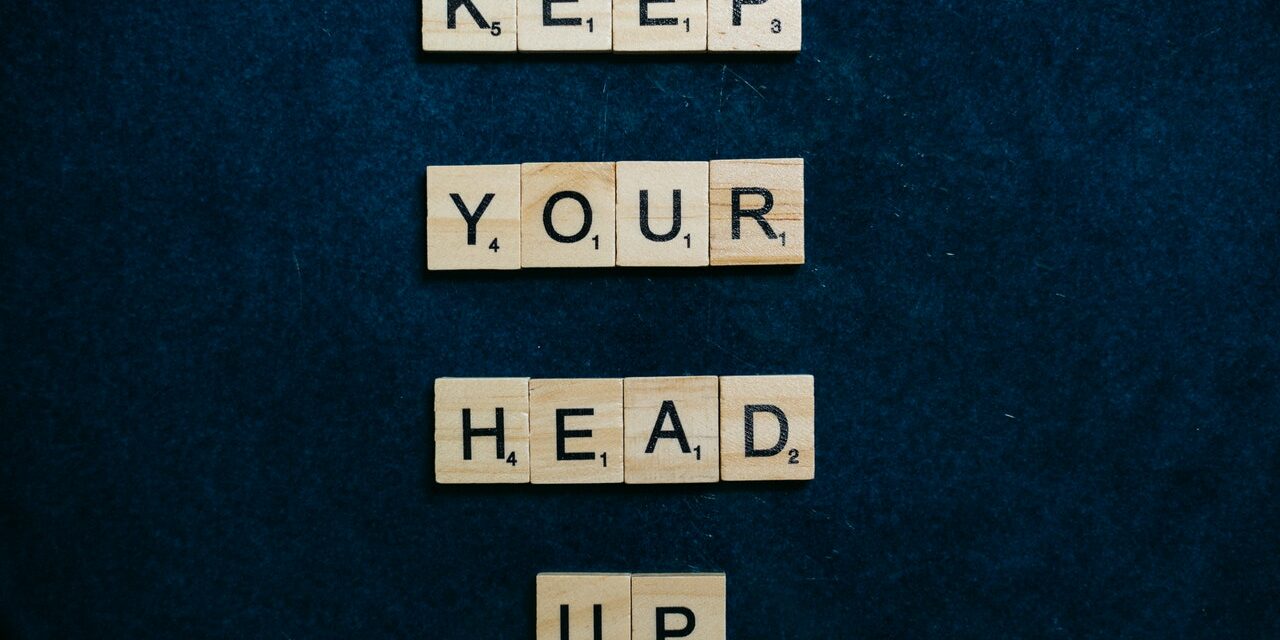 performance improvement plans Scrabble pieces spelling out keep your head up for performance improvement plans