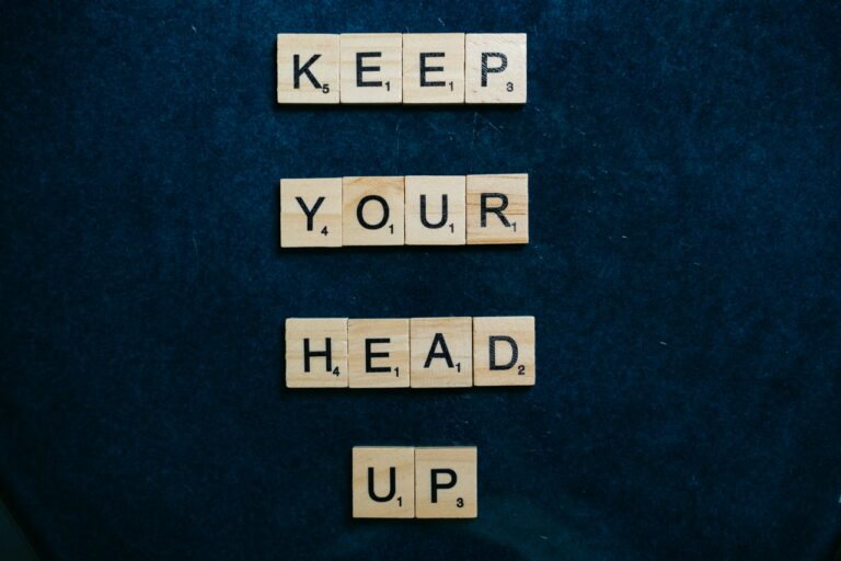 performance improvement plans Scrabble pieces spelling out keep your head up for performance improvement plans