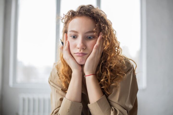 asking for feedback after job rejection woman perplexed having to write an email asking for feedback after job rejection