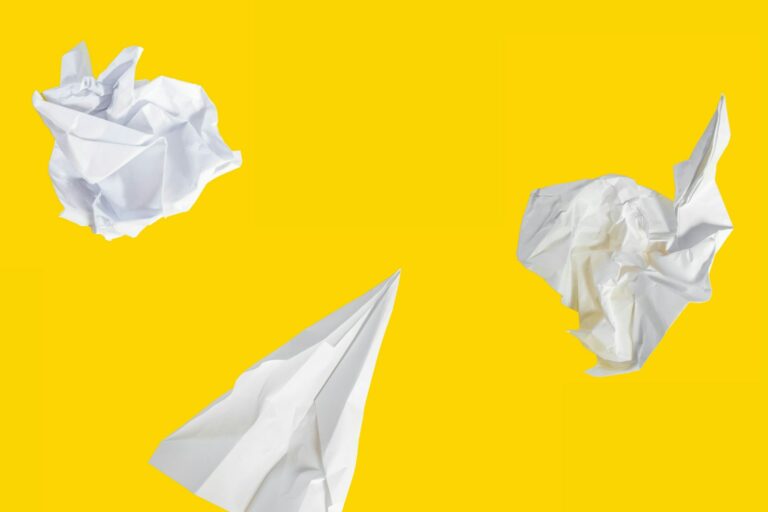 building and recruiting for a culture of innovation yellow background and crumbled up pieces of paper signifying innovation