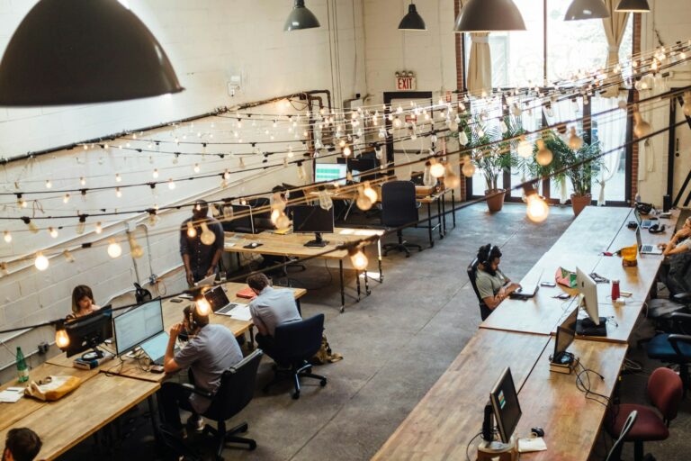 embedded teams for business growth a group of professionals as part of an embedded team working in a co-working space